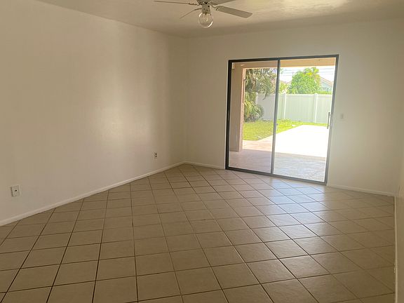 Main bedroom with sliding door to pool