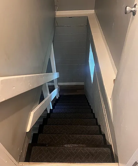Interior stairwell descending to basement