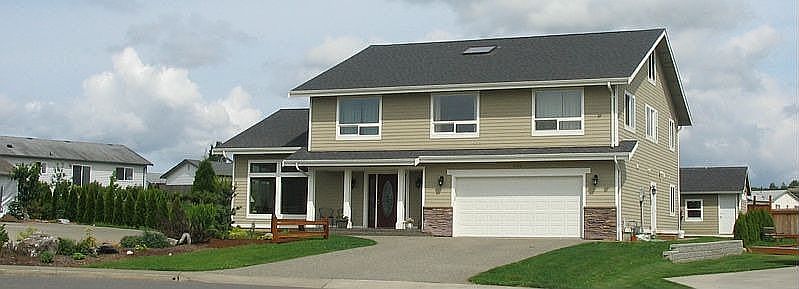 50 year siding, 40 year roof, custom large craftsman style home.