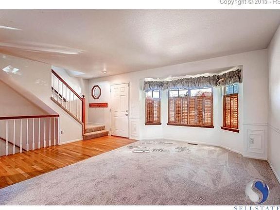 Warm, airy front entry and living room