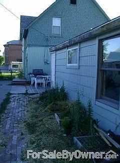 Sep Apt rental back of main house
						:
						See white door one entrance to sep apt now renting for $850 income property opt.