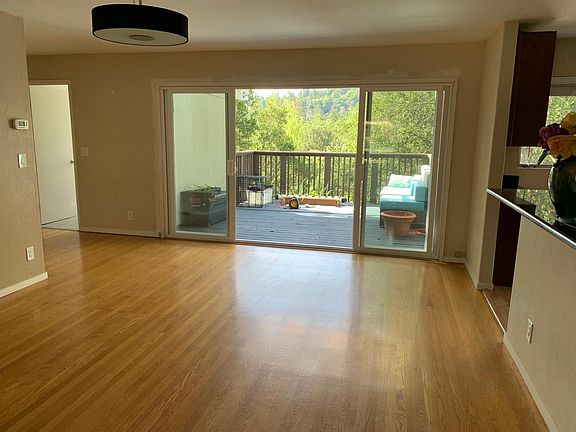 Dining area opens to private deck.