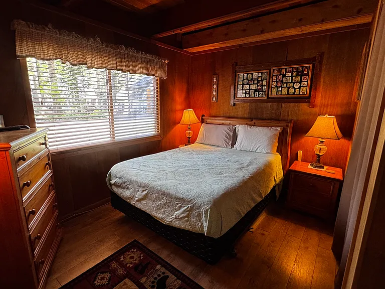 Downstairs master bedroom with queen bed.