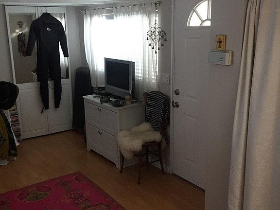 closet behind mirror, addl. closet behind curtain on right.