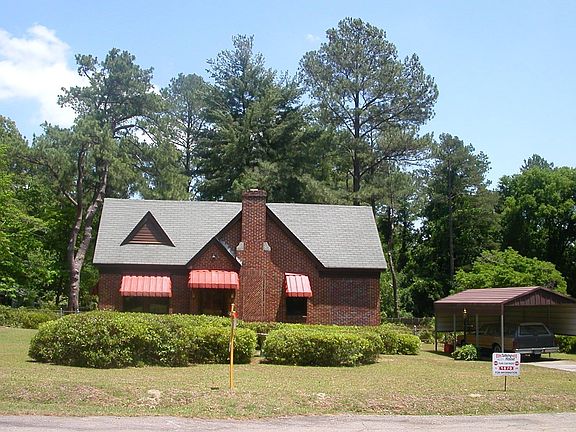 Front view with carport