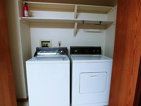LAUNDRY BY KITCHEN AND DOOR TO GARAGE