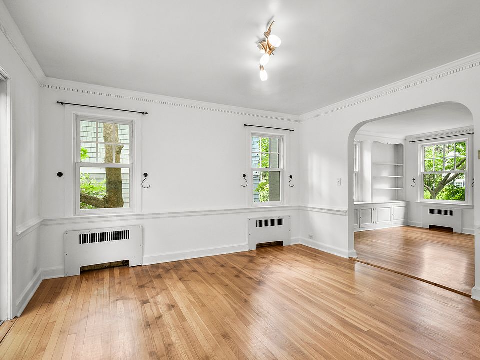 Formal dining room with access to the patio and backyard.