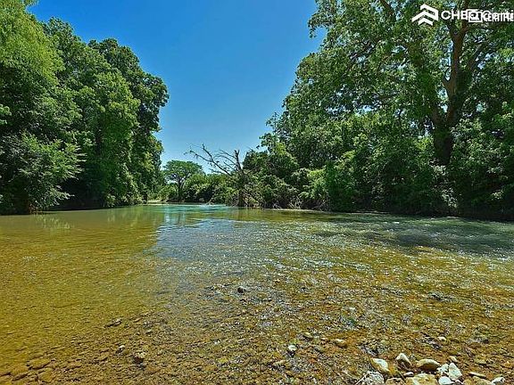 House is Located Along the San Marcos River