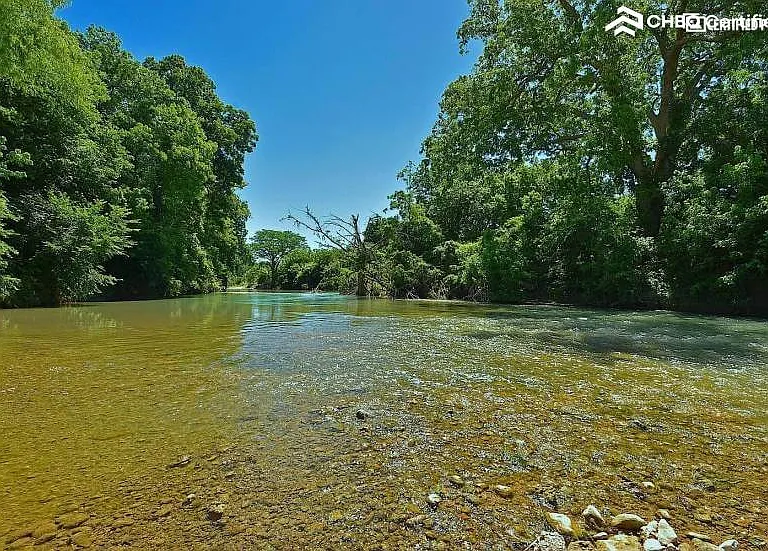 House is Located Along the San Marcos River