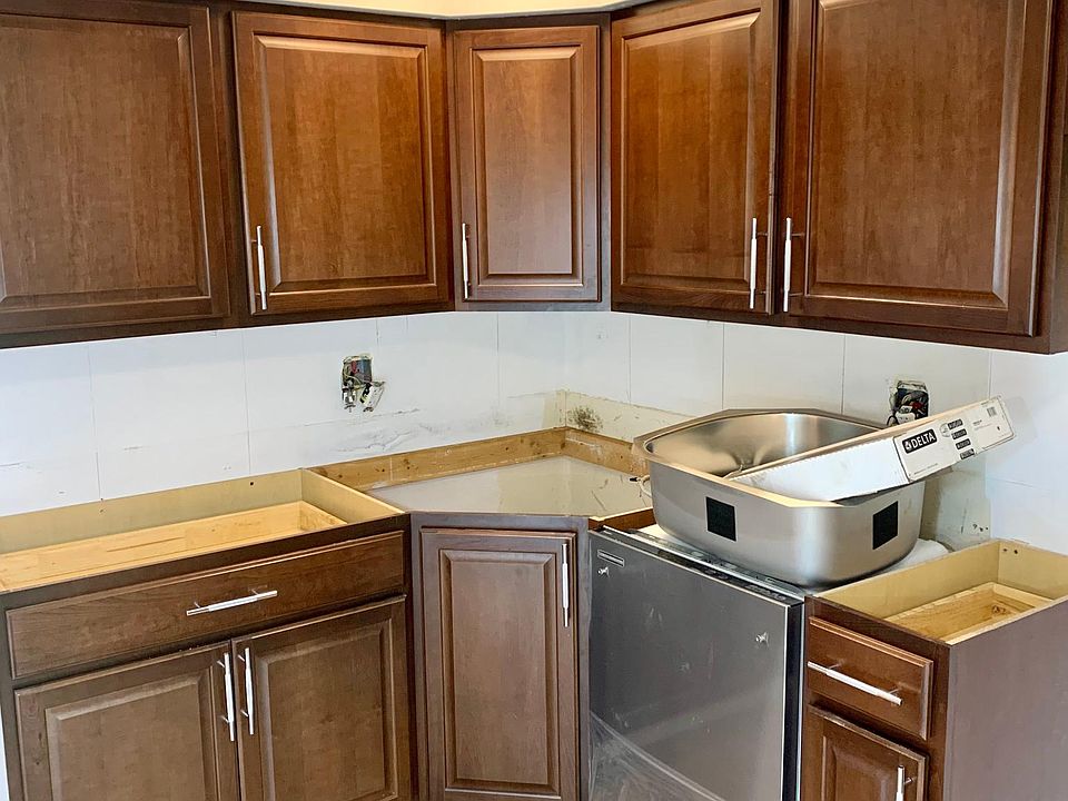 granite countertop and marble backsplash will be done shortly
