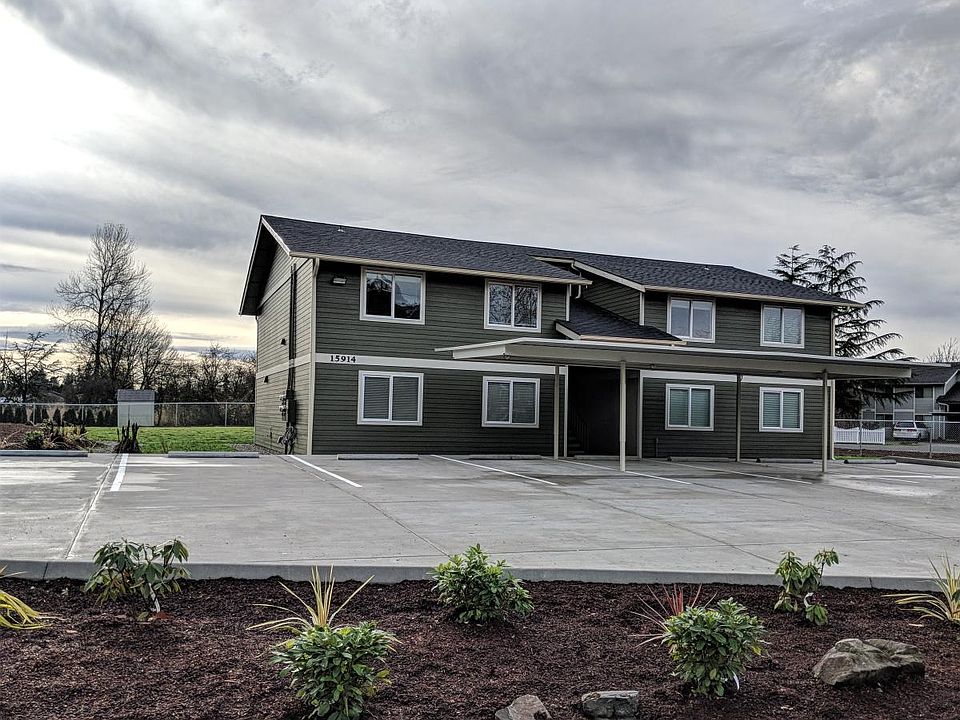 Exterior (new siding, paint, landscape, fence, parking lot)