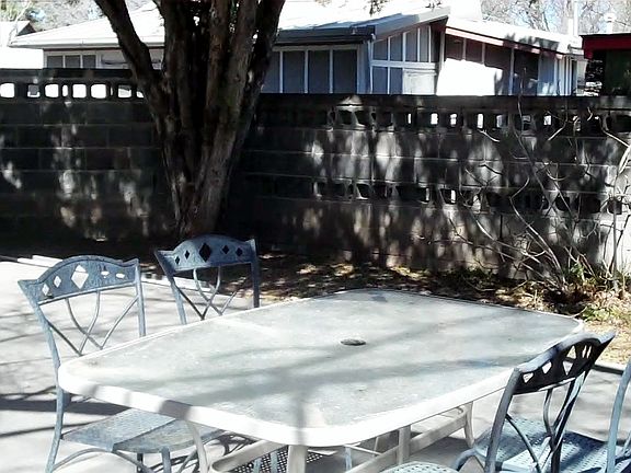 Patio, picnic table and chairs, tree