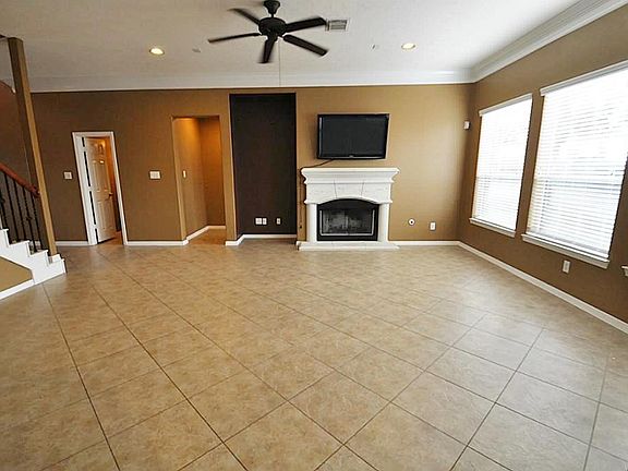 Large living room is great space for entertaining or watching the big game