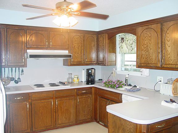 REAL wood cabinets have just been restained, cooktop, dbl sinks & c-fan.