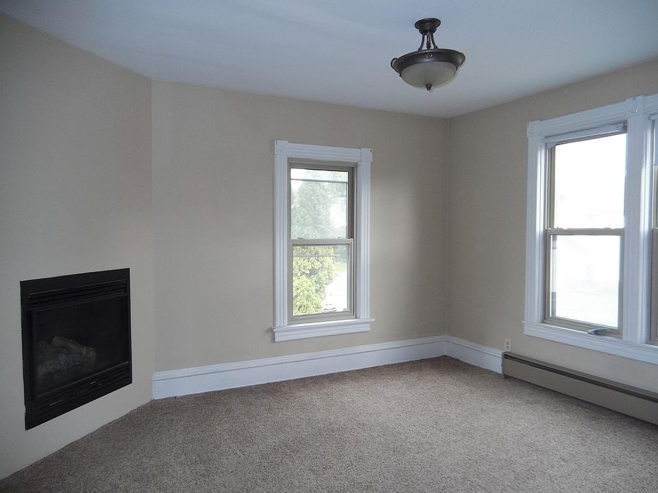 Living room with gas fireplace.