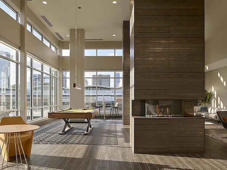 Clubroom Lounge with Direct Pool Access, Lounge Seating, Game Room, and Bar