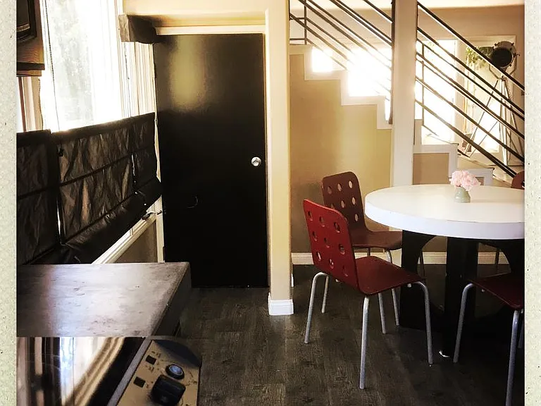 Kitchen facing back living room/patio