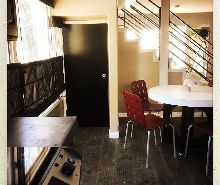 Kitchen facing back living room/patio