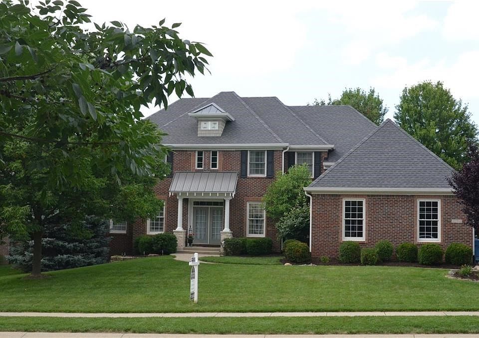 Stately brick exterior with architectural appeal! Third floor "dormer" adds charm!