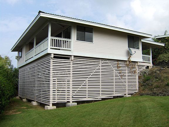 Elevated lanai on left has unblockable view of the Blue Pacific.
