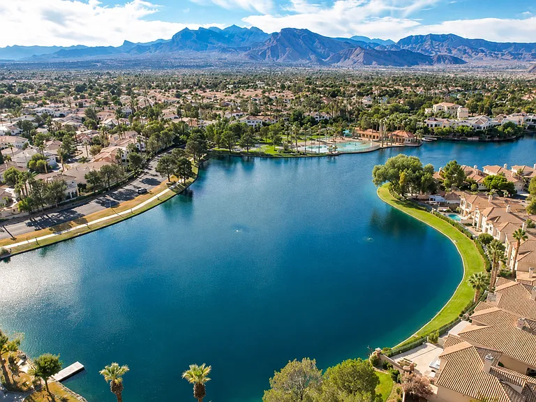Experience the sought-after Desert Shores lifestyle featuring picturesque lakes, lush surroundings, and serene waterfront recreation areas.
