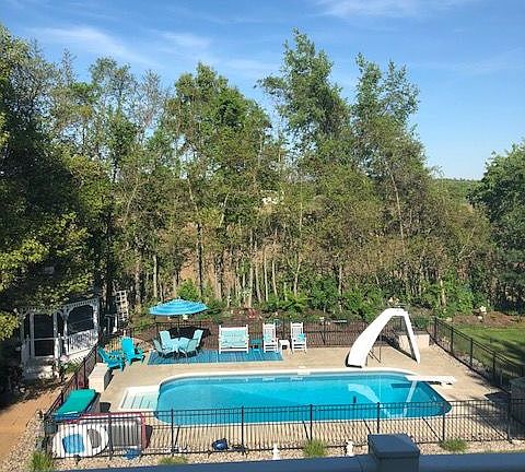 Pool w/ diving board & slide