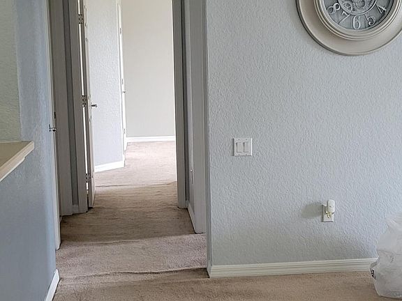 Dinning Room and pathway to the 2 Master Bedroom and 3rd Bedroom.