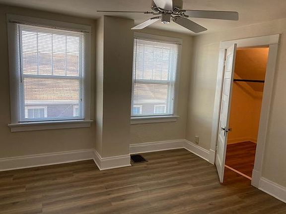 Bedroom with walk-in closet