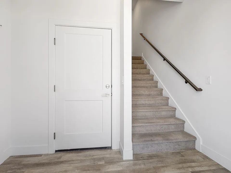 Entry way, ft garage door and stairs