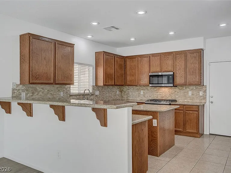 10439 Calypso Cave St — Photo 15
