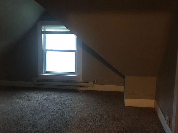 Unit 6 - Bedroom 3 or Living room area with closet/storage area.