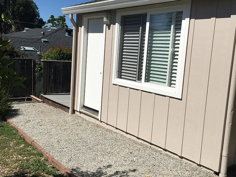 Separate entrance from the backyard to one of the masters.