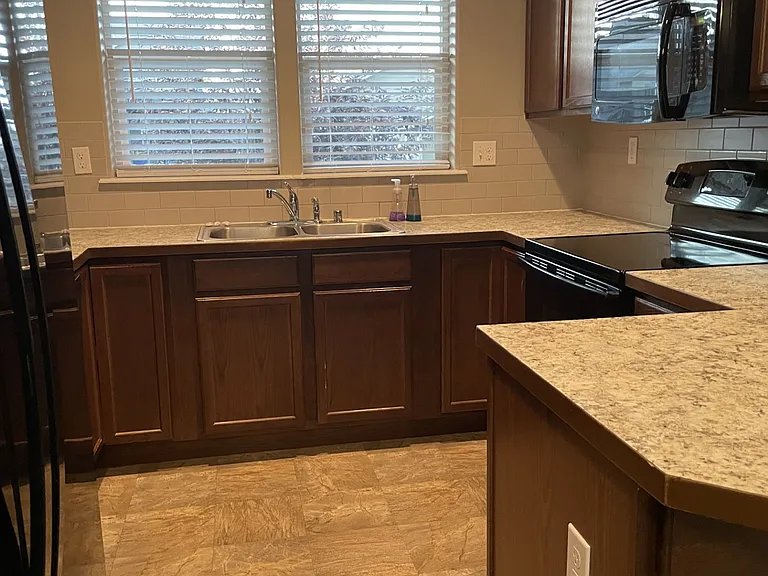 Kitchen View showing range + microwave