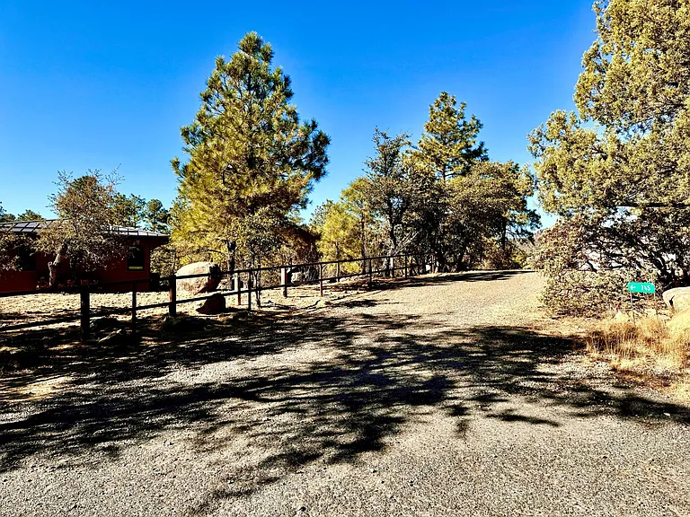 Other side of circle driveway. Property of over a half acre ensures privacy and spaciousnes