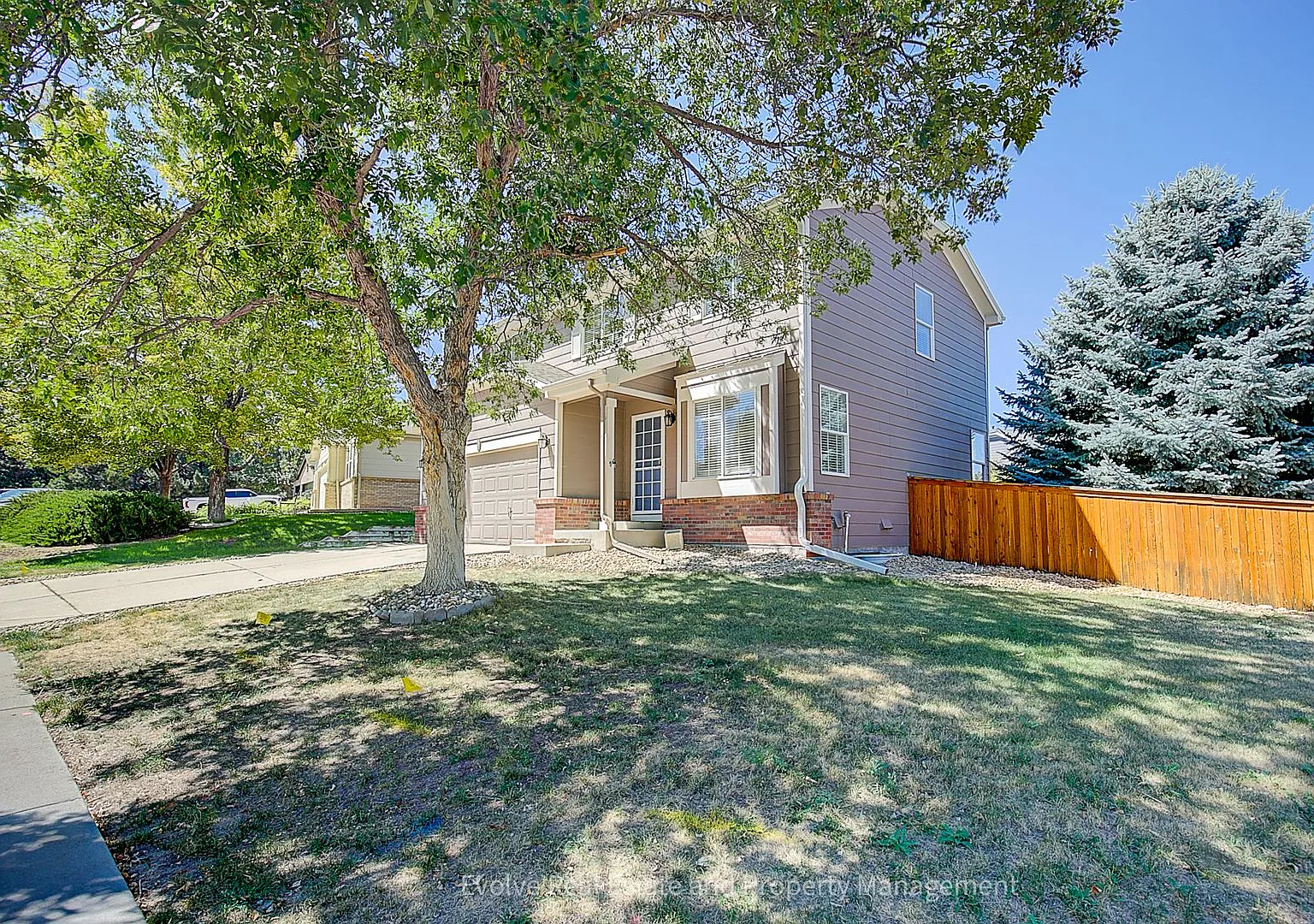 Evolve Real Estate: Beautiful 4-Bedroom Home in Lone Tree with Finished Basement! Available Septe... — Photo 4