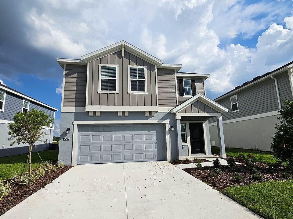 Front view- Driveway and main entrance