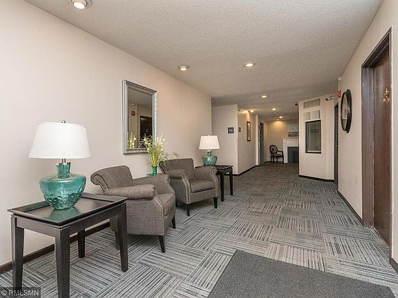 Main entry. Condo is on right, laundry room is left first door on that hallway, other amenities straight ahead.