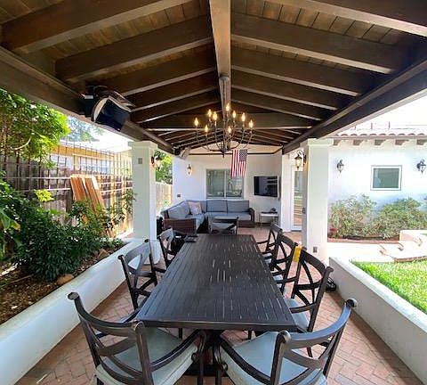 Outdoor dining and living patio. Bromic heaters to stay warm! Beautiful brick pavers.