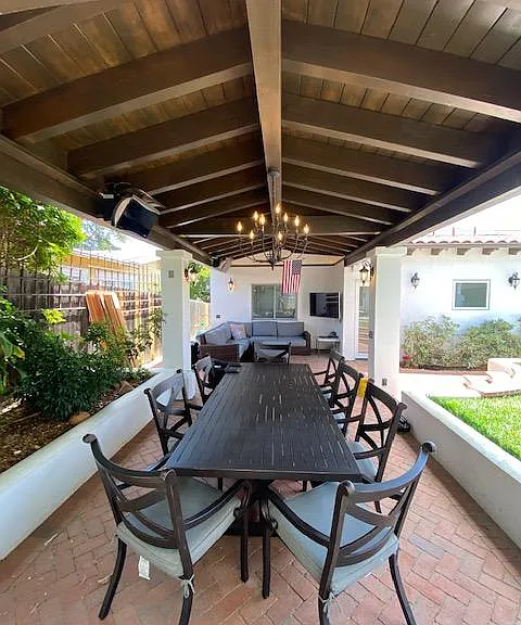 Outdoor dining and living patio. Bromic heaters to stay warm! Beautiful brick pavers.