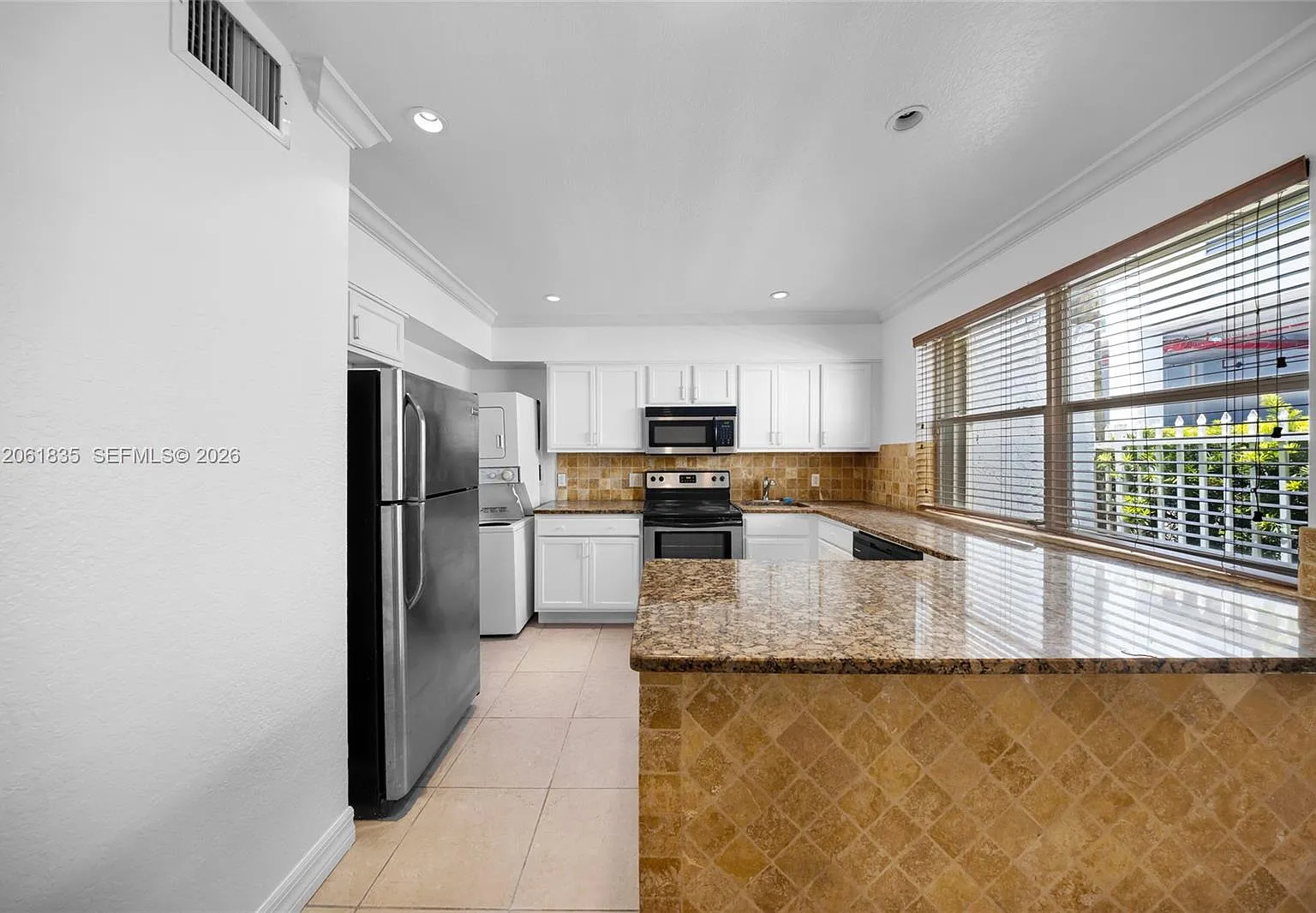 7801 Hispanola Ave — Photo 4
