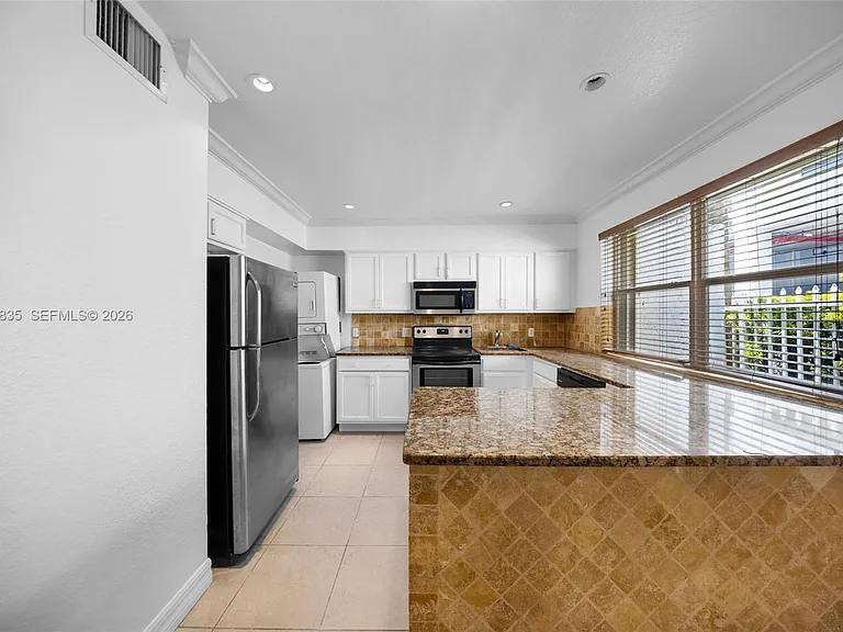 7801 Hispanola Ave #4 — Photo 4