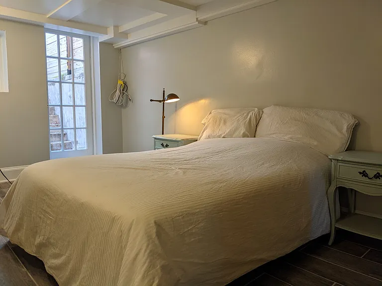 Bedroom has private back entrance.