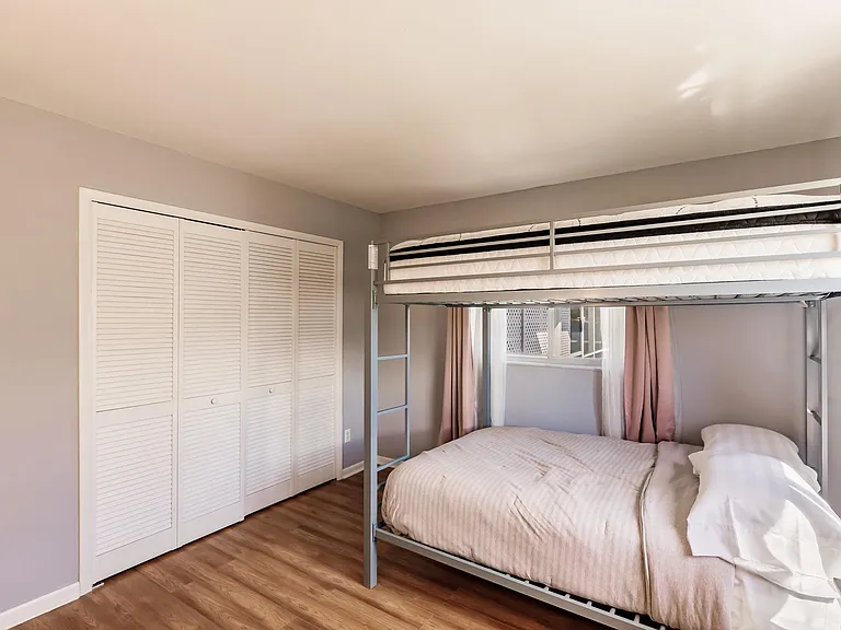 Queen full bunks in 3rd bedroom plus a desk for work space.