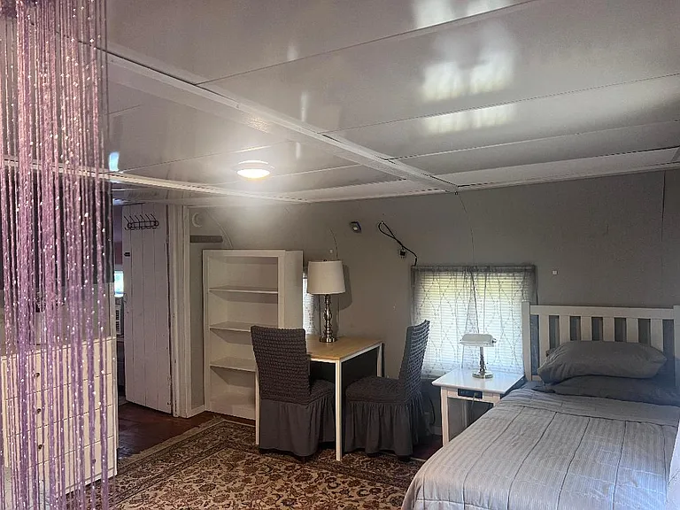 2nd floor twin bed #1. Dressers and work area