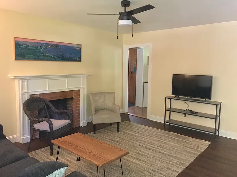 Living room / (original art throughout the house is by owners).