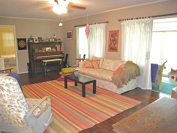 Abundant natural light, rustic hardwoods.