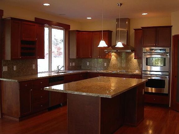 Huge Kitchen with seating for 6 around island, GE monogram,all stainless 