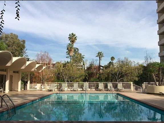 swimming pool and sunbathing area