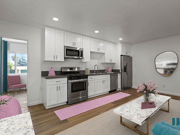 Open-Concept Kitchen, Dining, and Living Room Space
