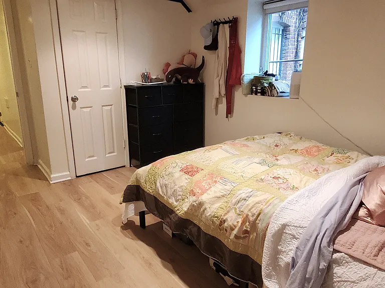 Second bedroom (has 2 windows, one behind the bed as shown in the next photo)